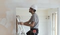 Professional construction worker doing a home makeover Royalty Free Stock Photo