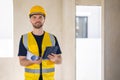 Professional construction worker engineer male. Real estate house project builder. Smart architect man standing work in Royalty Free Stock Photo
