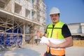 Professional construction worker engineer male. Real estate house project builder. Smart architect man standing work in Royalty Free Stock Photo