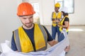 Professional construction worker engineer male. Real estate house project builder. Smart architect man standing work in Royalty Free Stock Photo