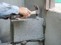 Professional construction worker laying bricks with cement Royalty Free Stock Photo