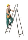 Professional constructor climbing ladder on white background Royalty Free Stock Photo