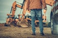 Professional Contractor Worker and a Construction Site Royalty Free Stock Photo