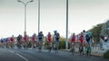 Professional cycling peloton during a night race Royalty Free Stock Photo