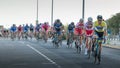 Professional cycling peloton during a night race Royalty Free Stock Photo