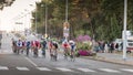 Professional cycling peloton during a night race Royalty Free Stock Photo