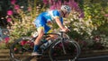 Professional cyclist in a corner at full speed Royalty Free Stock Photo