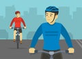 Professional cyclists. Close-up front view of cycling bike riders on the city road. Royalty Free Stock Photo