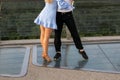 Professional dancers legs. Couple man and woman are dancing on the street Royalty Free Stock Photo