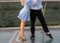 Professional dancers legs. Couple man and woman are dancing on the street Royalty Free Stock Photo