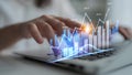 Professional data analysis with hand on laptop, graphs and charts representing growth and statistical trends in business Royalty Free Stock Photo