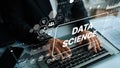 Professional Data Science Concept with Innovative Digital Graphics Displayed on Laptop Keyboard and Hands in a Modern Royalty Free Stock Photo