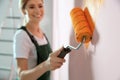 Professional decorator painting wall. Home repair service Royalty Free Stock Photo