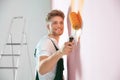 Professional decorator painting wall Royalty Free Stock Photo