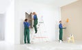 Professional decorators working. Home repair service Royalty Free Stock Photo