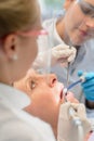 Professional dental team checkup patient woman