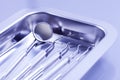 Professional dental tray with tools on blue background Royalty Free Stock Photo