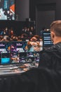 Professional designer with devices during the Korean Festival Auckland at trust arena in New Zealand