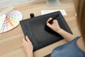 Professional designer working on tablet at desk, closeup Royalty Free Stock Photo