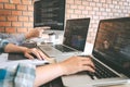 Professional Developer programmer cooperation meeting and brainstorming and programming in website working a software outsourcing Royalty Free Stock Photo