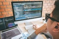 Professional Developer programmer working a software website design and coding technology, writing codes and database in company