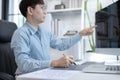 Professional development programmers are laying out a structure or draft on paper in preparation Royalty Free Stock Photo