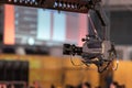 Professional digitak video camera on crane record live on event broadcasting at night concert outdoors Royalty Free Stock Photo