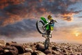 Professional dirt bike rider doing wheely Royalty Free Stock Photo