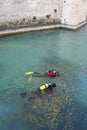 SIRMIONE, ITALY, - OCTOBER 28, 2021 - Scuba divers workers underwater archaeology works at Lago di Garda.