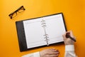 Professional doctor writing medical records in a notebook Royalty Free Stock Photo