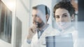 Doctors team examining a patient`s x-ray Royalty Free Stock Photo