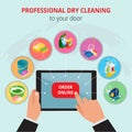 Professional Dry Cleaning To Your Door conept. Hand holding tablet with application house search cleaning service.