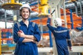 Professional electricity train rail engineer worker working train service inspector checking track rail system in train depot Royalty Free Stock Photo