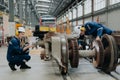 Professional electricity train rail engineer worker working train service inspector checking track rail system in train depot Royalty Free Stock Photo