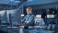 Professional Electronics Development Engineer Working in the Futuristic Technology Research Agency Royalty Free Stock Photo