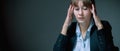 Professional and emotional burnout. Portrait of exhausted and tired business woman in the office. Horizontal image. Copy space Royalty Free Stock Photo