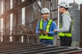 Professional engineer mechanic team working together in locomotive train deport work checking train spare parts in the locomotive Royalty Free Stock Photo