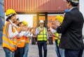 Professional Engineering and worker team congratulated success by applaud their jubilant leader after construction project