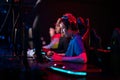 Professional esports players at an online game tournament. The cyber team plays computers and trains