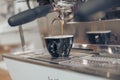 Professional espresso machine brewing coffee in coffee shop Royalty Free Stock Photo