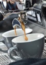 Professional espresso machine while preparing two espressos. Coffee machine. Royalty Free Stock Photo