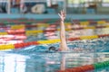 Female athlete swimming backstroke in the pool Royalty Free Stock Photo