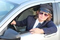 Professional female chauffeur wearing formal uniform
