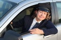 Professional female chauffeur wearing formal uniform