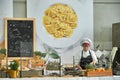 professional female chef of catering food service preparing italian pasta