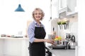 Professional female chef cooking vegetables Royalty Free Stock Photo