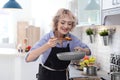 Professional female chef cooking vegetables Royalty Free Stock Photo