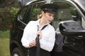 Professional female driver adjusting her tie