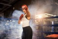 Professional female fighter in ring Royalty Free Stock Photo