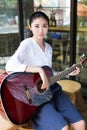 Professional female guitarist Royalty Free Stock Photo